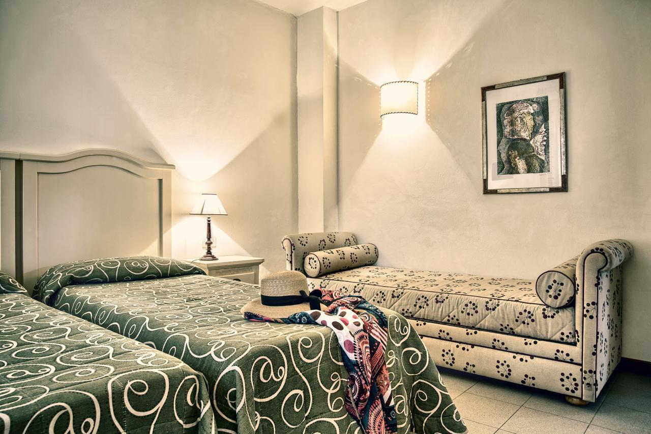 Roccamare Resort - Ville E Appartamenti Кастильоне-делла-Пеская Экстерьер фото