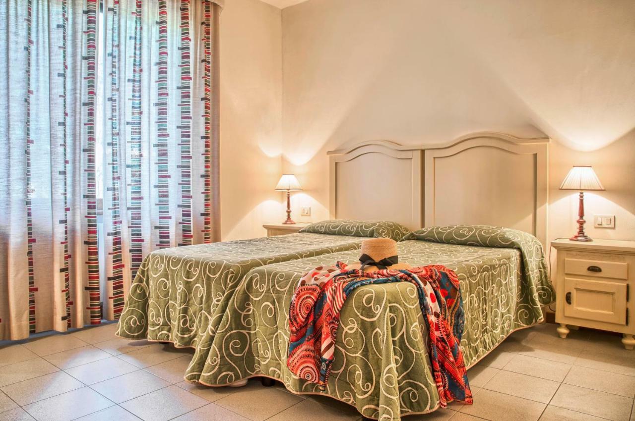 Roccamare Resort - Ville E Appartamenti Кастильоне-делла-Пеская Экстерьер фото